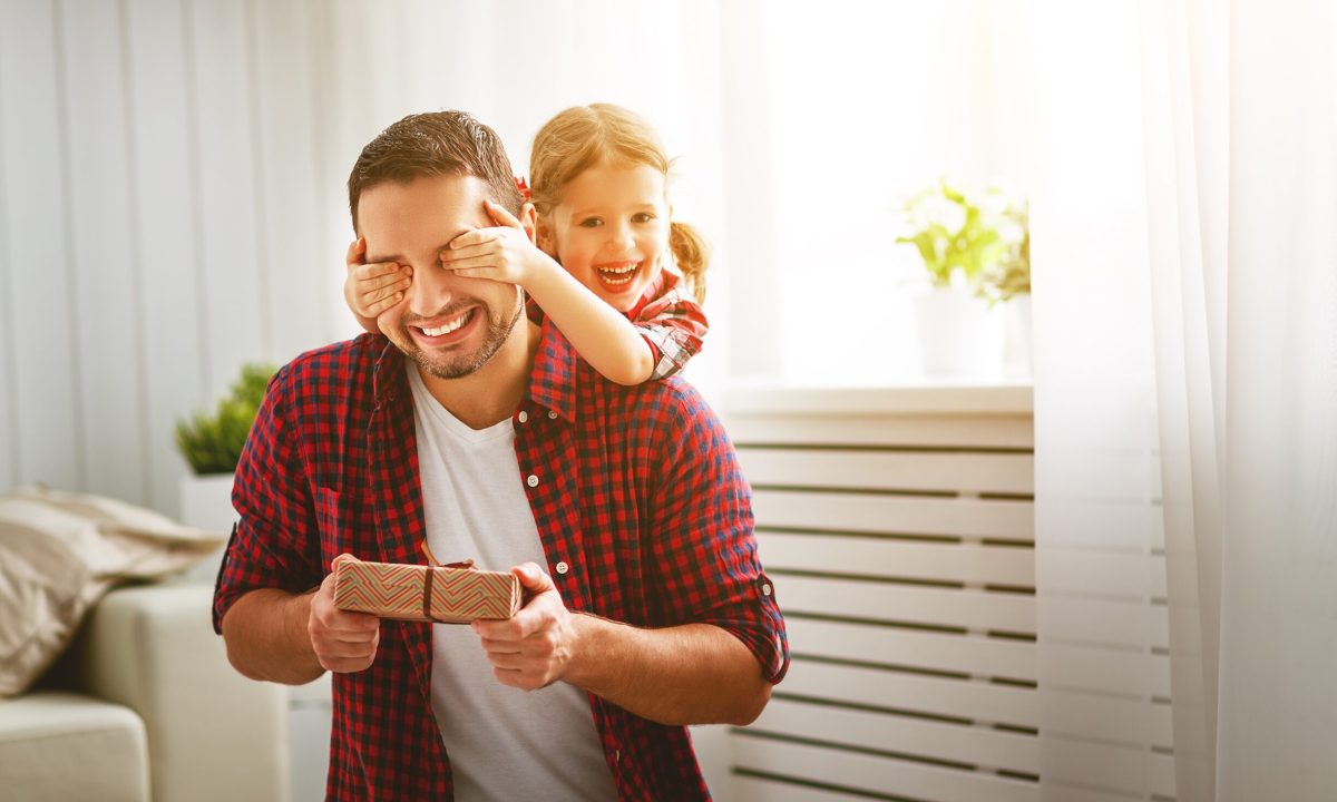 Father's,Day.,Happy,Family,Daughter,Hugging,Dad,And,Laughs,On